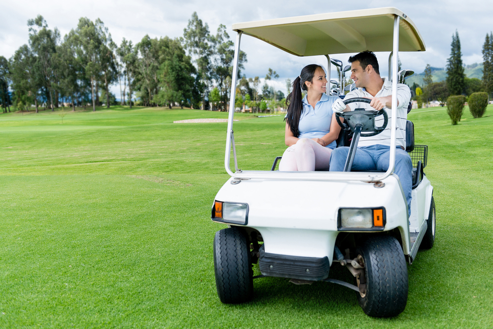 golf buggy at the course golf buggy at the course